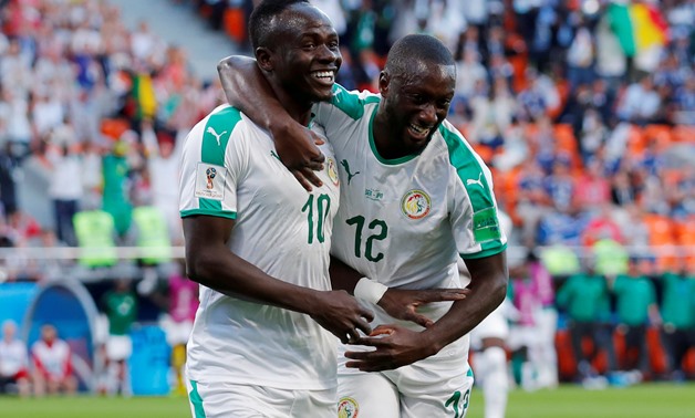 Soccer Football - World Cup - Group H - Japan vs Senegal - Ekaterinburg Arena, Yekaterinburg, Russia - June 24, 2018 Senegal's Sadio Mane celebrates with Youssouf Sabaly after scoring their first goal REUTERS/Andrew Couldridge TPX IMAGES OF THE DAY
