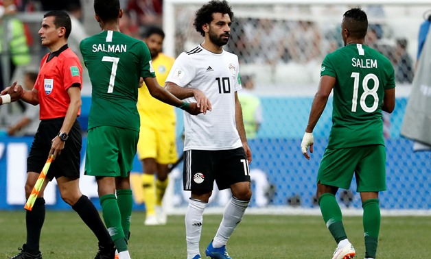 Soccer Football - World Cup - Group A - Saudi Arabia vs Egypt - Volgograd Arena, Volgograd, Russia - June 25, 2018 Egypt's Mohamed Salah looks dejected as he shakes hands with Saudi Arabia's Salman Al-Faraj after the match - REUTERS/Damir Sagolj 