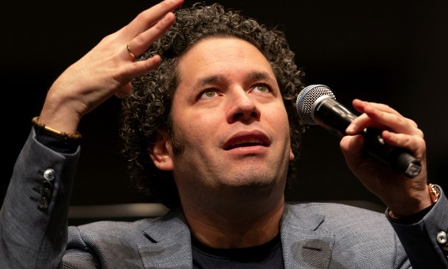 Venezuelan conductor Gustavo Dudamel is known for his work encouraging low-income youth to learn music and perform in concerts - AFP
