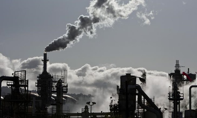 Smoke is released into the sky at the ConocoPhillips oil refinery in San Pedro, California March 24, 2012. Picture taken March 24, 2012.
