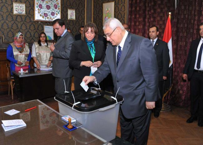 Former President Adly Mansour casting his vote in the 2014 presidential election. 