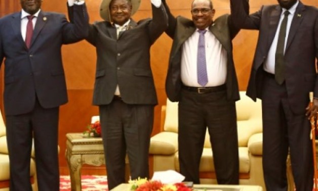 © AFP | From left to right, South Sudan opposition leader Riek Machar, Ugandan President Yoweri Museveni, Sudanese President Omar al-Bashir and South Sudanese President Salva Kiir at peace talks in khartoum
