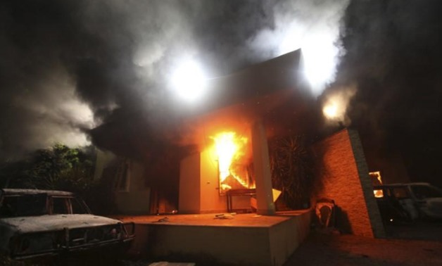 FILE PHOTO: The U.S. Consulate in Benghazi is seen in flames during a protest by an armed group said to have been protesting a film being produced in the United States September 11, 2012. REUTERS/Esam Al-Fetori
