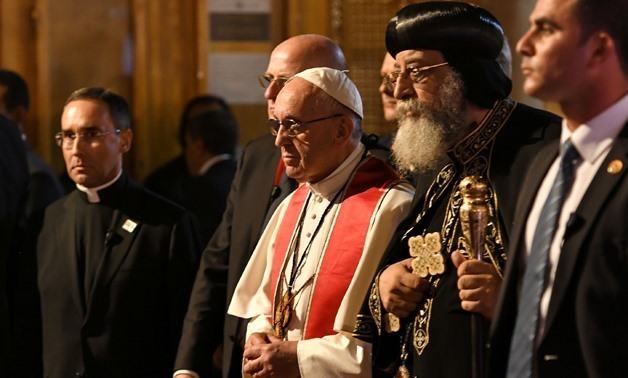 FILE- Pope Tawadros II and Pope Francis during his visit to Cairo on May 10, 2018
