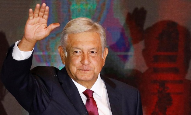 Presidential candidate Andres Manuel Lopez Obrador waves as he addresses supporters after polls closed in the presidential election, in Mexico City, Mexico July 1, 2018. REUTERS/Carlos Jasso
