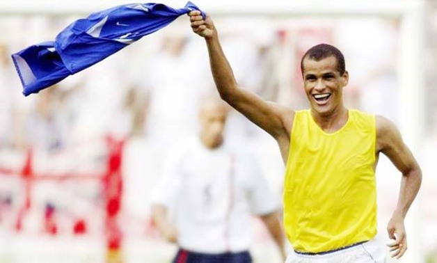 Rivaldo celebrates scoring against England at 2002 World Cup quarter finals, Reuters