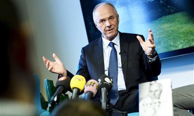 Soccer coach Sven-Goran Eriksson, manager of Chinese Super League team Guangzhou R&F, smiles during a news conference promoting his memoirs in Stockholm November 6, 2013. REUTERS/Claudio Bresciani/TT News Agency
