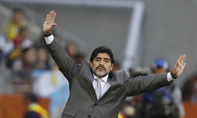 Argentina's coach Diego Maradona gestures during the 2010 World Cup quarter-final soccer match against Germany at Green Point stadium in Cape Town July 3, 2010. REUTERS/Kai Pfaffenbach