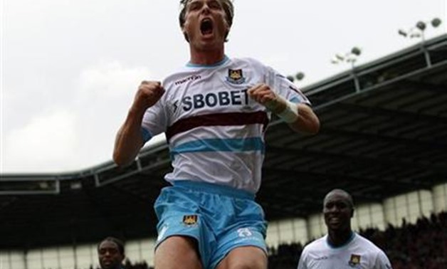 West Ham United's Scott Parker celebrates his goal against Stoke City during their English Premier League soccer match at the Britannia Stadium in Stoke-on-Trent, central England, September 18, 2010. REUTERS/Darren Staples