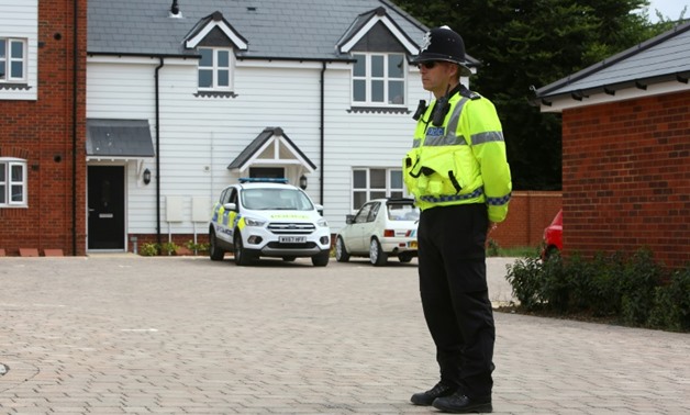 A couple in their 40s were found unconscious at their home in the southern English village of Amesbury after exposure to an unknown substance, with police declaring a "major incident"
