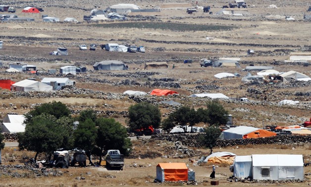A general view of refugee tents erected in Syria seen from the Israeli-occupied Golan Heights, Israel July 4, 2018. REUTERS/Ammar Awad