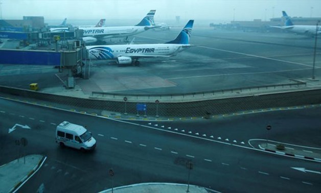 EgyptAir and EgyptAir Express planes are seen parked at Cairo Airport - Reuters