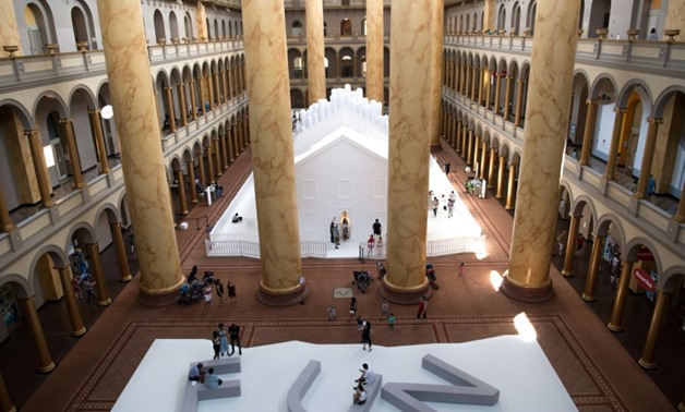 New York-based collective Snarkitecture erected an all-white house in the National Building Museum's Great Hall in Washington/AFP/SAUL LOEB