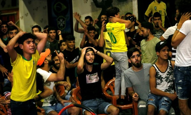 Lebanese fans watch Brazil play Belgium in the World Cup on July 6, 2018, in the Ersal district of southern Beirut
AFP / ANWAR AMRO
