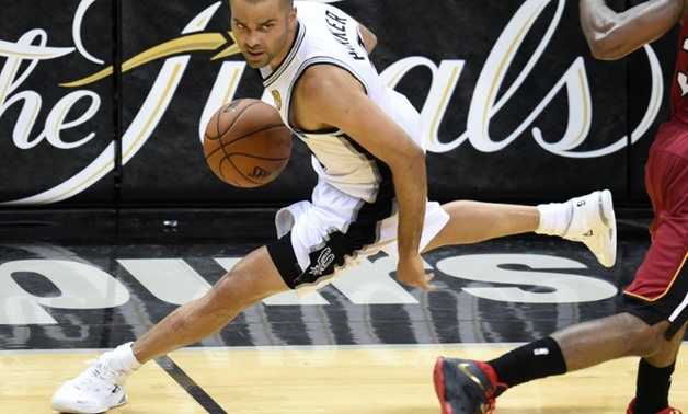 French-born guard Tony Parker is leaving the San Antonio Spurs, where he has been since 2001, to play for the Charlotte Hornets
AFP/File / Robyn BECK
