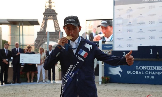 Sameh El-Dahan celebrating his gold medal in the Paris 2018 Longines Global Champions tour - Press image courtesy of AFP