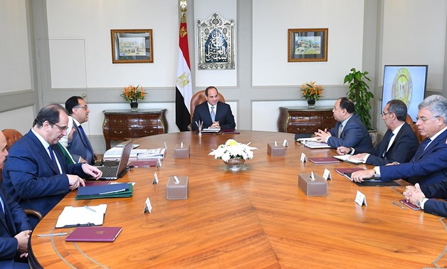 President Abdel Fatah al-Sisi during a meeting with Prime Minister Mostafa Madbouli, Head of Egypt's Intelligence Service Abbas Kamel and the ministers of finance, health and communications on July 8, 2018 - Press photo