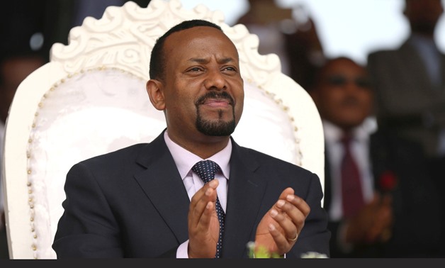 FILE PHOTO: Ethiopia's Prime Minister Abiy Ahmed attends a rally during his visit to Ambo in the Oromiya region, Ethiopia April 11, 2018. REUTERS/Tiksa Negeri