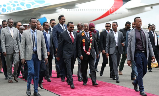 Ethiopia's Prime Minister Abiy Ahmed welcomes Eritrean Foreign Minister Osman Saleh and his delegation - Reuters

