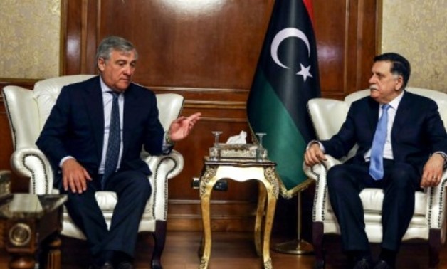 © AFP | European Parliament President Antonio Tajani (L) meets with Libya's unity government Prime Minister Fayez al-Sarraj at his office in the capital Tripoli on July 9, 2018
