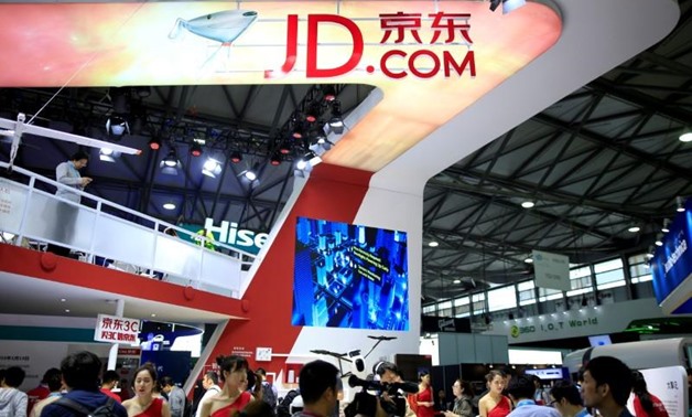 FILE PHOTO: A sign of China's e-commerce company JD.com is seen at CES (Consumer Electronics Show) Asia 2016 in Shanghai, China, May 12, 2016. REUTERS/Aly Song/File Photo
