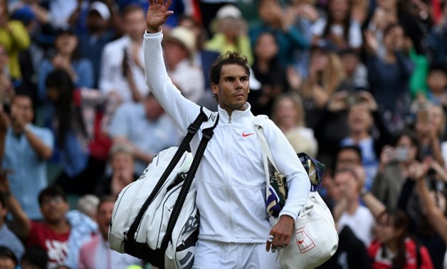 Chasing a third Wimbledon title: Rafael Nadal
AFP / Glyn KIRK
