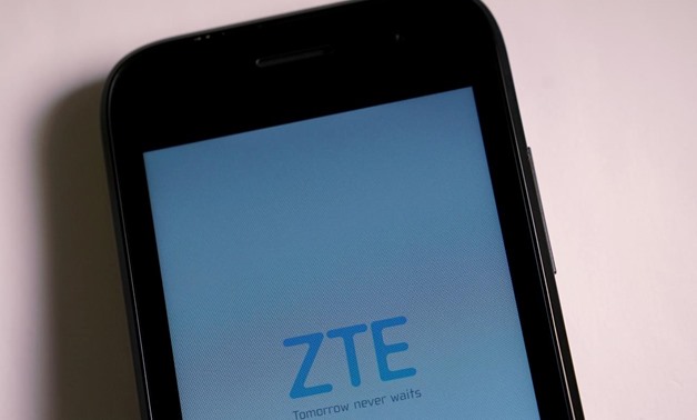 FILE PHOTO: A ZTE smart phone is pictured in this illustration taken April 17, 2018. REUTERS/Carlo Allegri/Illustration/File Photo
