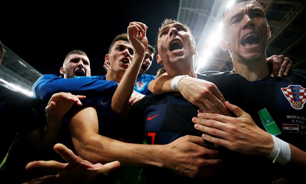 Soccer Football - World Cup - Semi Final - Croatia v England - Luzhniki Stadium, Moscow, Russia - July 11, 2018 Croatia's Mario Mandzukic celebrates scoring their second goal with teammates REUTERS/Carl Recine TPX IMAGES OF THE DAY. SEARCH "FIFA BEST" FOR