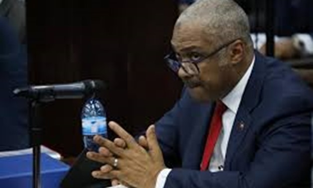 Haitian Prime minister Jack Guy Lafontant gestures during a meeting with members of the Parliament in Port-au-Prince, Haiti, July 14, 2018.
