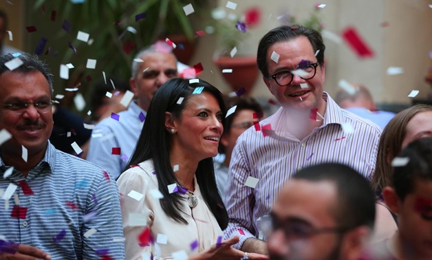 Minister of Tourism Rania al-Mashat celebrates France’s winning of World Cup 2018 alongside French ambassador Stephane Roumtier and fans at Institut francais d'Egypte on July 15, 2018 - Egypt Today/By Hussein Tallal