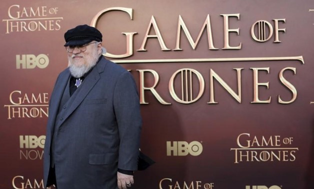 FILE PHOTO: Co-executive producer George R.R. Martin arrives for the season premiere of HBO's "Game of Thrones" in San Francisco, California March 23, 2015. REUTERS/Robert Galbraith/File Photo.