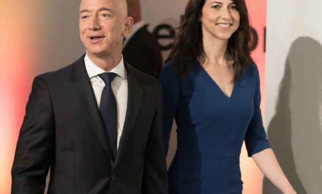 Amazon CEO Jeff Bezos and his wife MacKenzie Bezos are seen in Berlin in April 2018 where he received the Axel Springer Award-dpa/AFP/File / Jörg Carstensen

