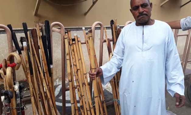 Sabri Sayed selling batons in Qus, Qena - Egypt Today/Wael Mohammed