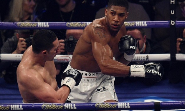 Anthony Joshua goes on the offensive against Joseph Parker - AFP/File / Oli SCARFF