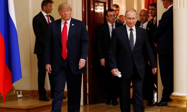 U.S. President Donald Trump and Russia's President Vladimir Putin arrive to hold a joint news conference after their meeting in Helsinki, July 16, 2018. REUTERS/Kevin Lamarque