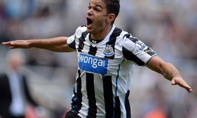Newcastle United's Hatem Ben Arfa celebrates scoring against Fulham during their English Premier League soccer match at St James' Stadium in Newcastle, northern England, August 31, 2013. REUTERS/Nigel Roddis 