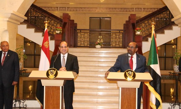 Egypt’s President Abdel Fatah al-Sisi with Sudanese counterpart Omar Al-Bashir in Khartoum – press photo