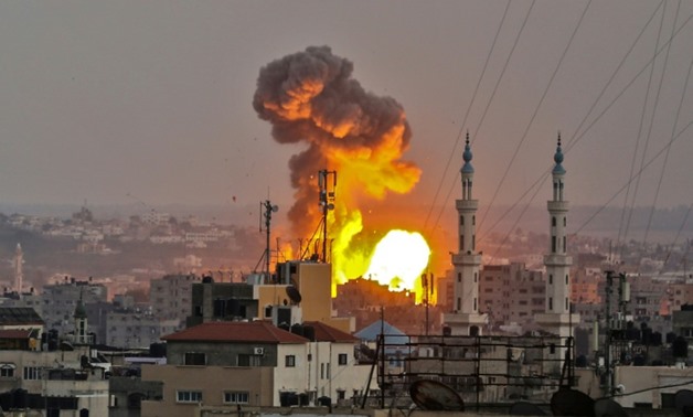 A fireball explodes in Gaza City during an Israeli bombardment on July 20, 2018 as months of tensions spiralled over into fresh violence
