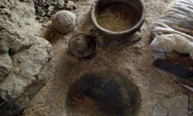 This undated photo provided by the Egyptian Ministry of Antiquities, shows a 4,000-year-old pottery manufacturing workshop that was recently discovered close to the Nile River in Aswan province, southern Egypt. A statement on July 19, 2018, by the Antiqui