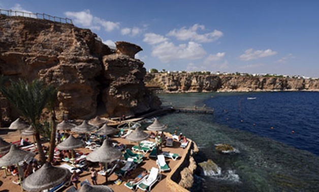 Tourists sunbathe in the Egyptian resort of Sharm el-Sheikh on November 7, 2015 – AFP
