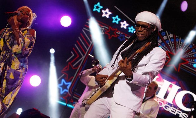 Singer/guitarist Nile Rodgers leads Chic through their hit-packed performance to 20,000 people at the Mawazine Festival in Rabat, Morocco, on Sunday. Youssef Boudlal / Reuters
