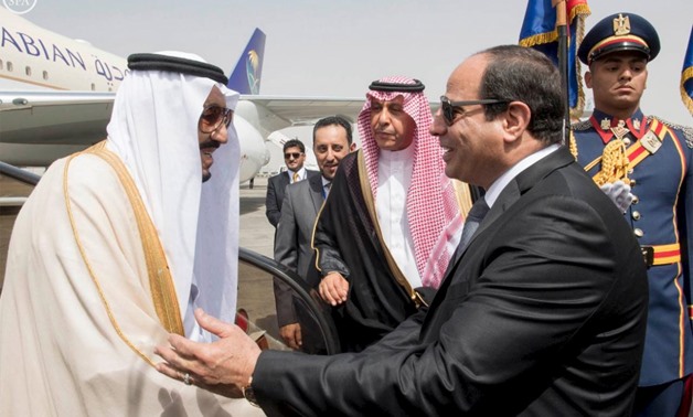 Egypt's President Abdel Fattah al-Sisi welcomes Saudi Arabia's King Salman in Cairo, Egypt, in this handout photo received April 7, 2016. REUTERS