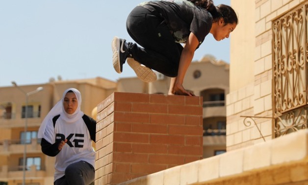 Egyptian women from Parkour Egypt "PKE" practice their parkour skills around buildings on the outskirts of Cairo, Egypt July 20, 2018. REUTERS/Amr Abdallah Dalsh
