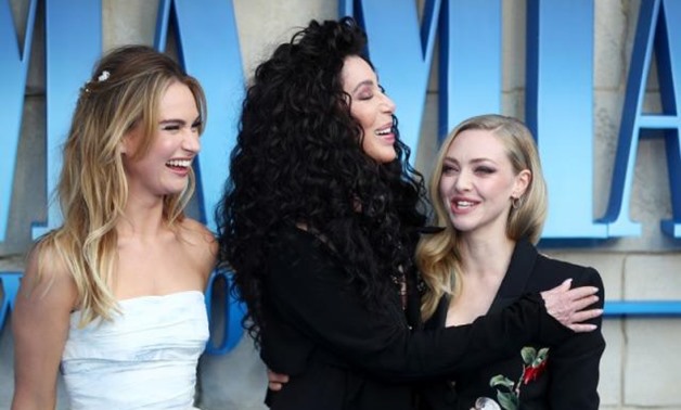 Cher, Lilly James and Amanda Seyfried attend the world premiere of Mamma Mia! Here We Go Again at the Apollo in Hammersmith, London, Britain, July 16, 2018. REUTERS/Hannah McKay.