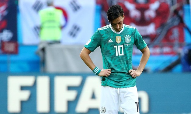 FILE PHOTO: Soccer Football - World Cup - Group F - South Korea vs Germany - Kazan Arena, Kazan, Russia - June 27, 2018 Germany's Mesut Ozil looks dejected after the match REUTERS/Michael Dalder
