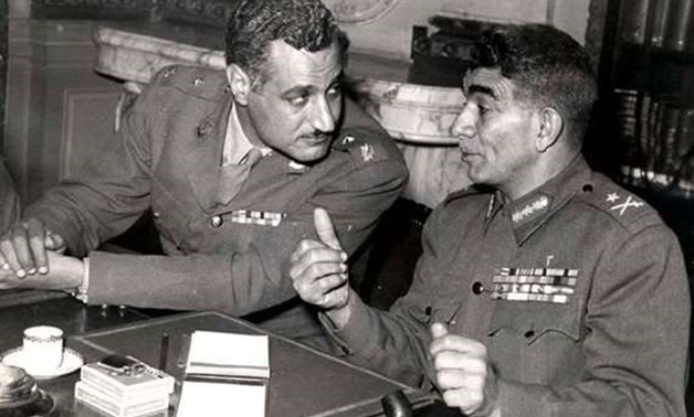 FILE – Gamal Abdel Nasser (L), Mohamed Naguib (R)