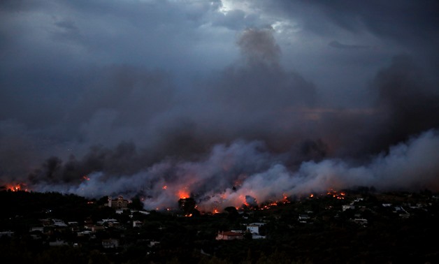 A wildfire rages in the town of Rafina, near Athens, Greece, July 23, 2018. REUTERS/Alkis Konstantinidis
