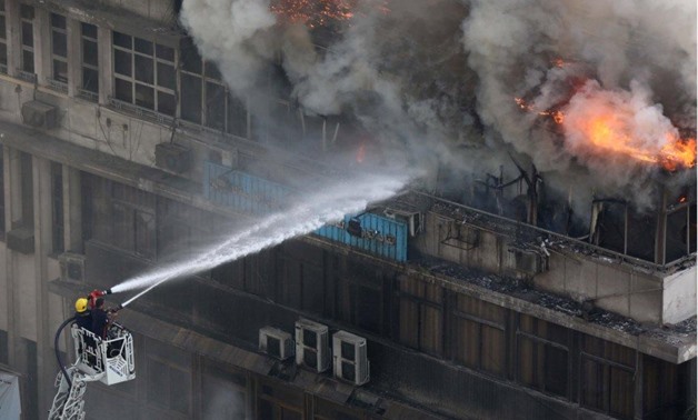 A fire broke out at the Syndicate of Commercial Professions’ top floor located in Ramses street in Cairo, July, 24, 2018 - Egypt Today