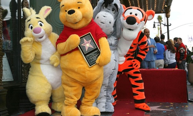 Rabbit, Winnie The Pooh, Eeyore and Tigger pose for photos as Winnie The Pooh receives a star on the Hollywood Walk of Fame on April 11, 2006-Getty Images/Getty Images/AFP / Michael Buckner

