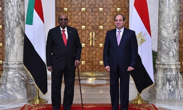 Egypt’s President Abdel Fatah al-Sisi with Sudanese counterpart Omar Al-Bashir in Khartoum – Press photo
